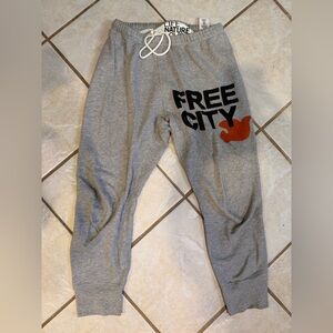 freecity Gray Sweatpants with Black Logo and Rust Accent